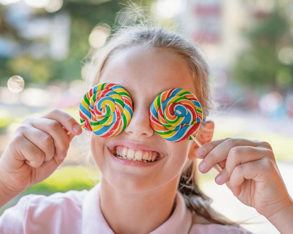 girl smiling lollipops girl smiling lollipops