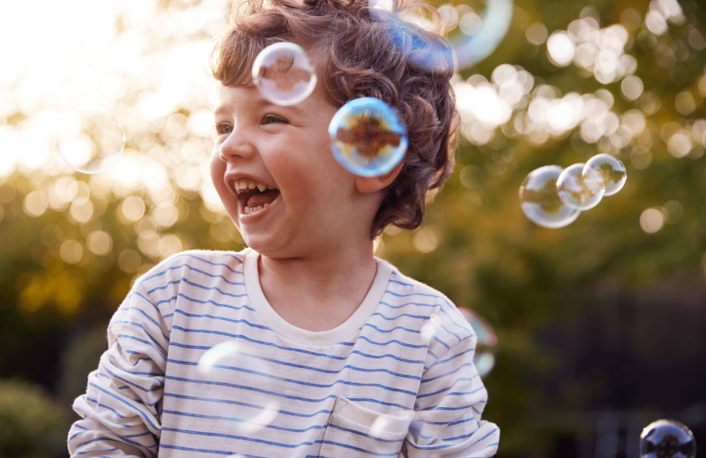 kid laughing bubbles