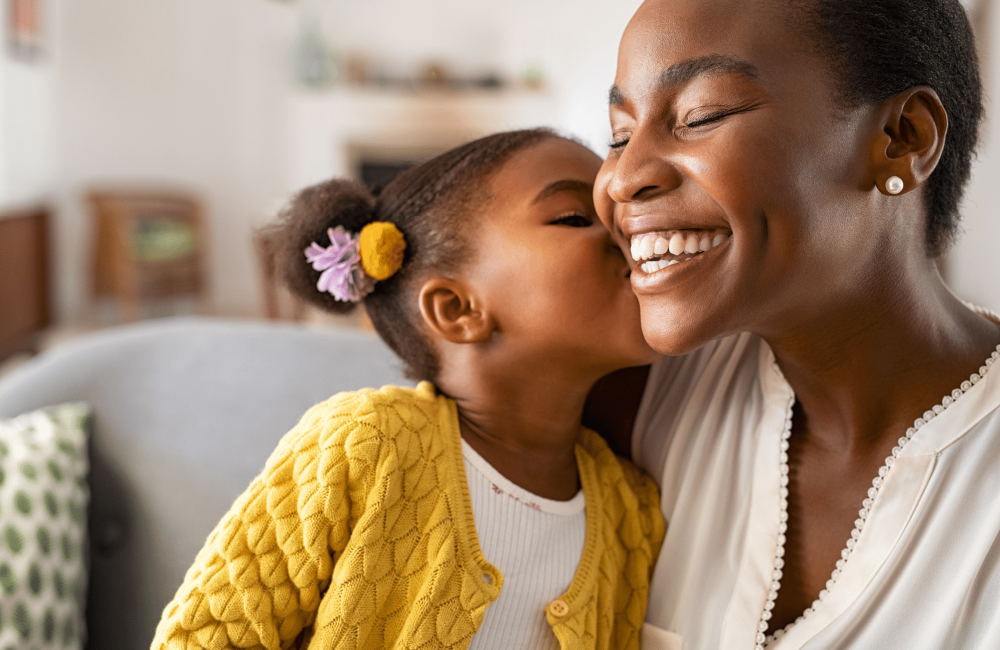 mom and daughter kiss